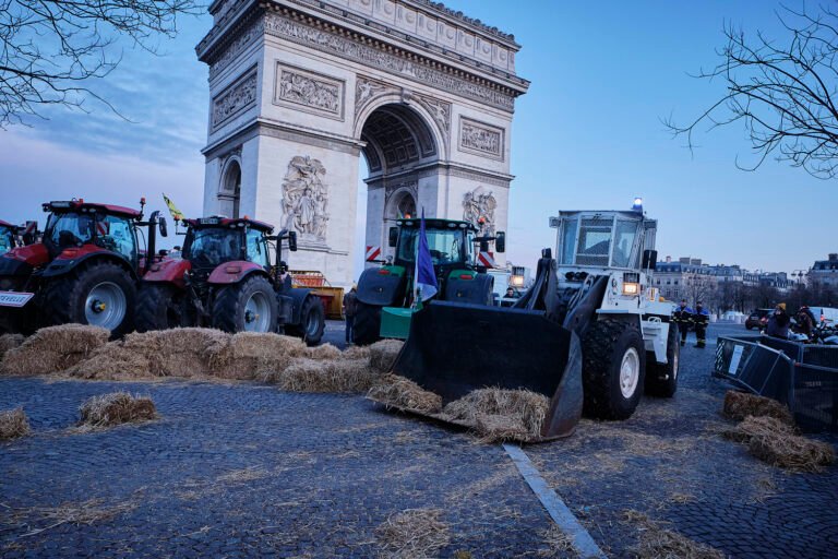 Why are angry farmers blocking highways from Paris to New Delhi?