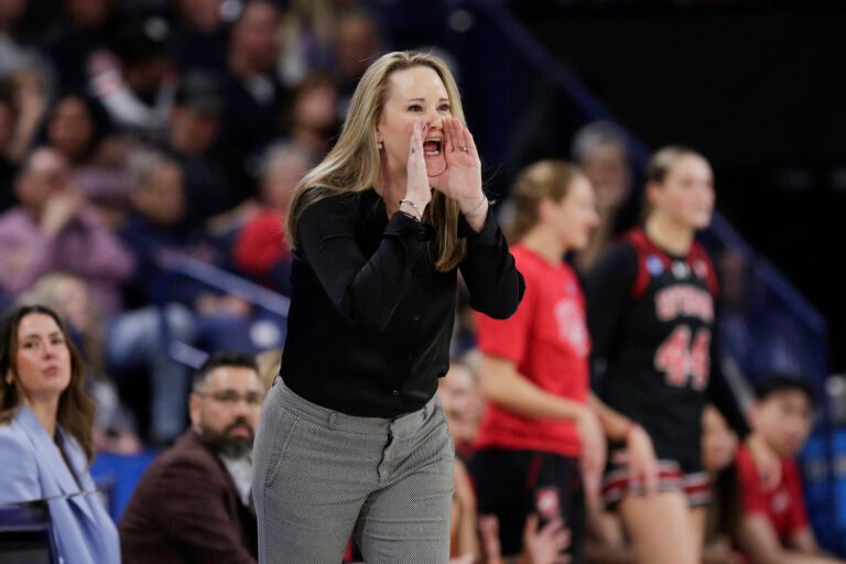 Utah coach says her team had to switch hotels after racist attacks during NCAA Tournament