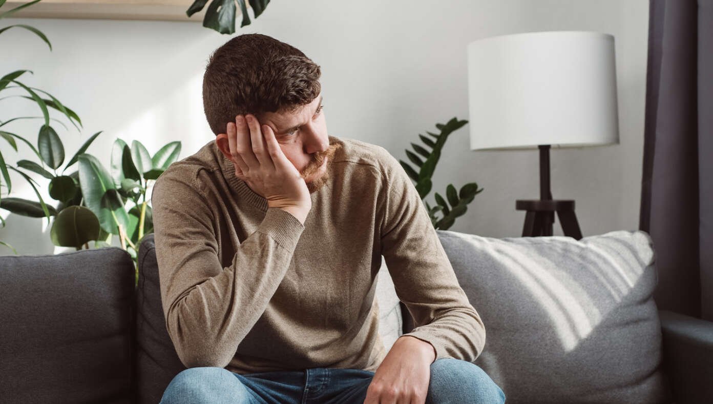 Man Struggling To Read Bible As It’s Way Over There On The Shelf