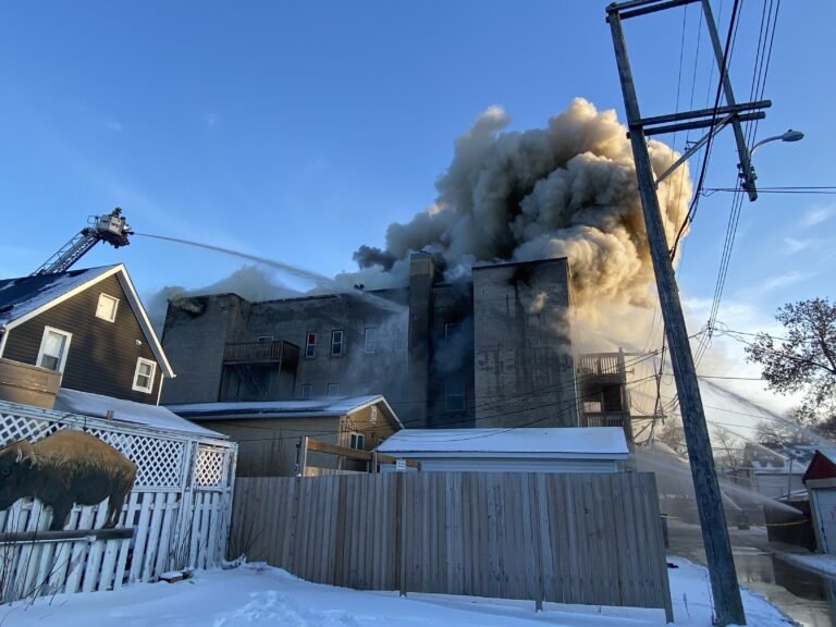 Fire burns at apartment building on Toronto Street