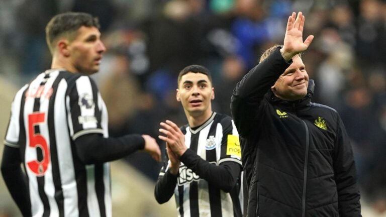 Newcastle beats Wolves for first EPL home win since December. Rock star Knopfler on hand