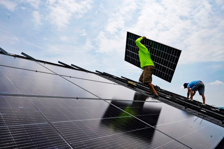 Biden is marking Earth Day by announcing $7 billion in federal solar power grants