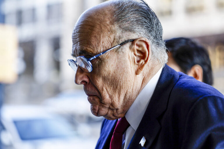 Rudy Giuliani is served indictment papers at his own birthday party after mocking Arizona attorney general