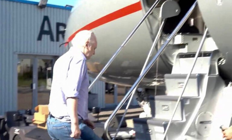 Julian Assange travels to a remote Pacific island to enter plea deal with the U.S.