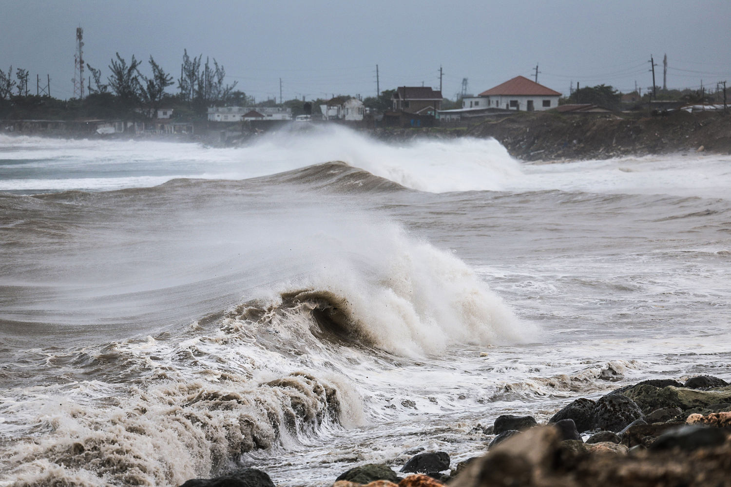 Beryl weakens to a tropical storm after hitting Mexico but could become a hurricane again as it heads to Texas