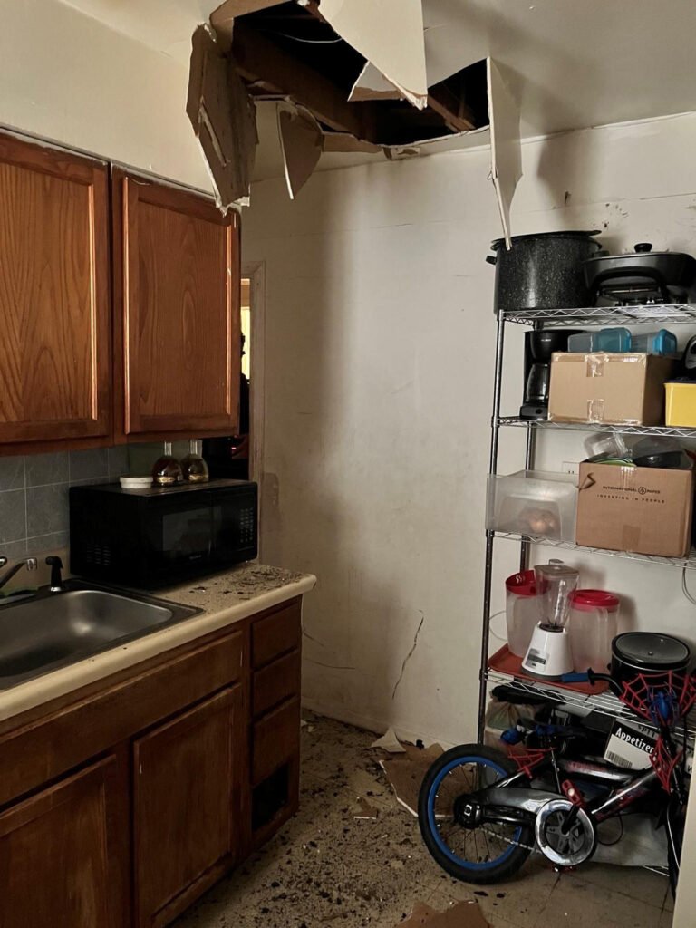 Officials were seeking a Tennessee murder suspect when he came crashing through the ceiling