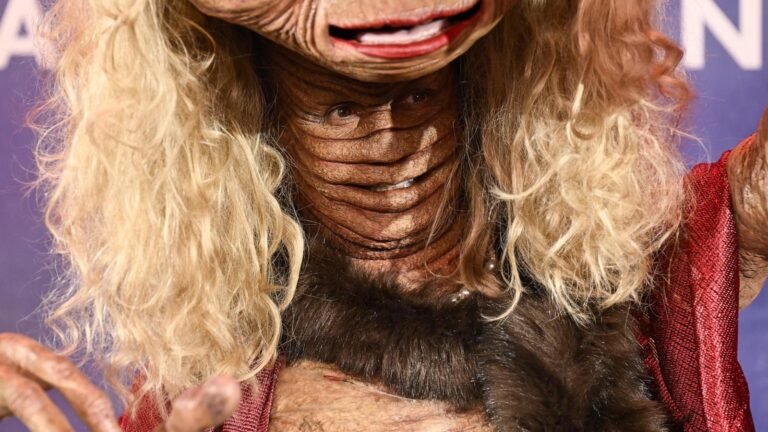 Heidi Klum and Janelle Monáe wear elaborate E.T. costumes for their Halloween parties